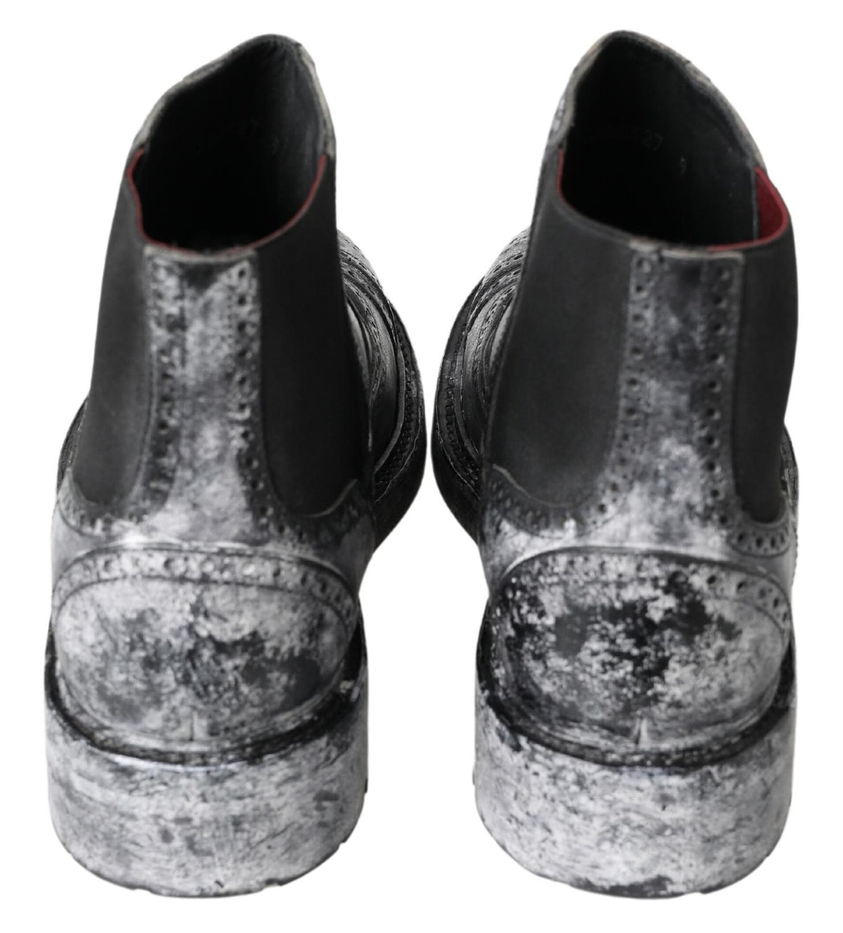 Experience the allure of Dolce & Gabbana Black Gray Leather Ankle Boots, where exquisite Italian craftsmanship meets luxurious design, perfect for the discerning individual.