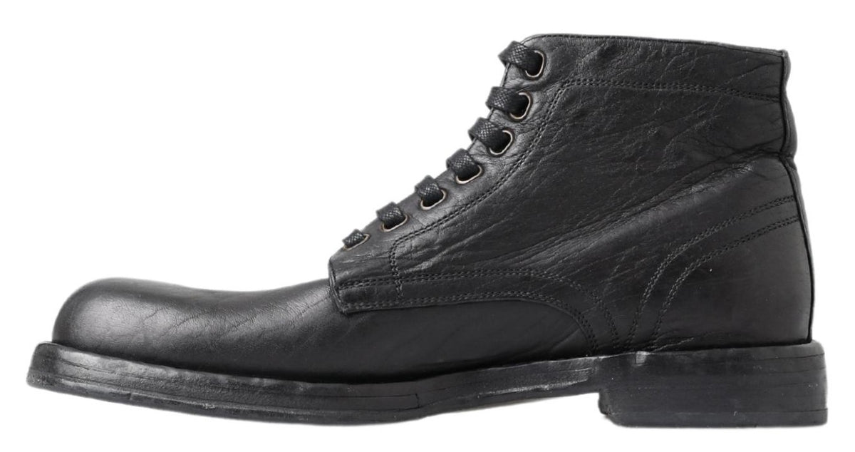 Indulge in the exquisite Dolce & Gabbana Black Horse Leather Perugino Boots, where Italian craftsmanship meets timeless elegance, elevating your style with luxurious sophistication.