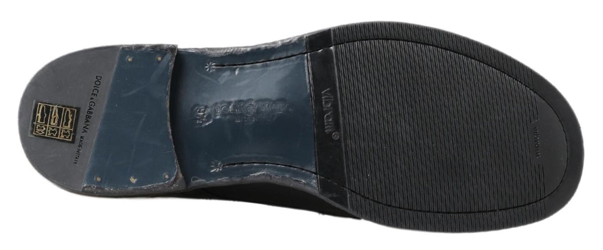Indulge in the exquisite Dolce & Gabbana Black Horse Leather Perugino Boots, where Italian craftsmanship meets refined elegance, perfect for the discerning individual.