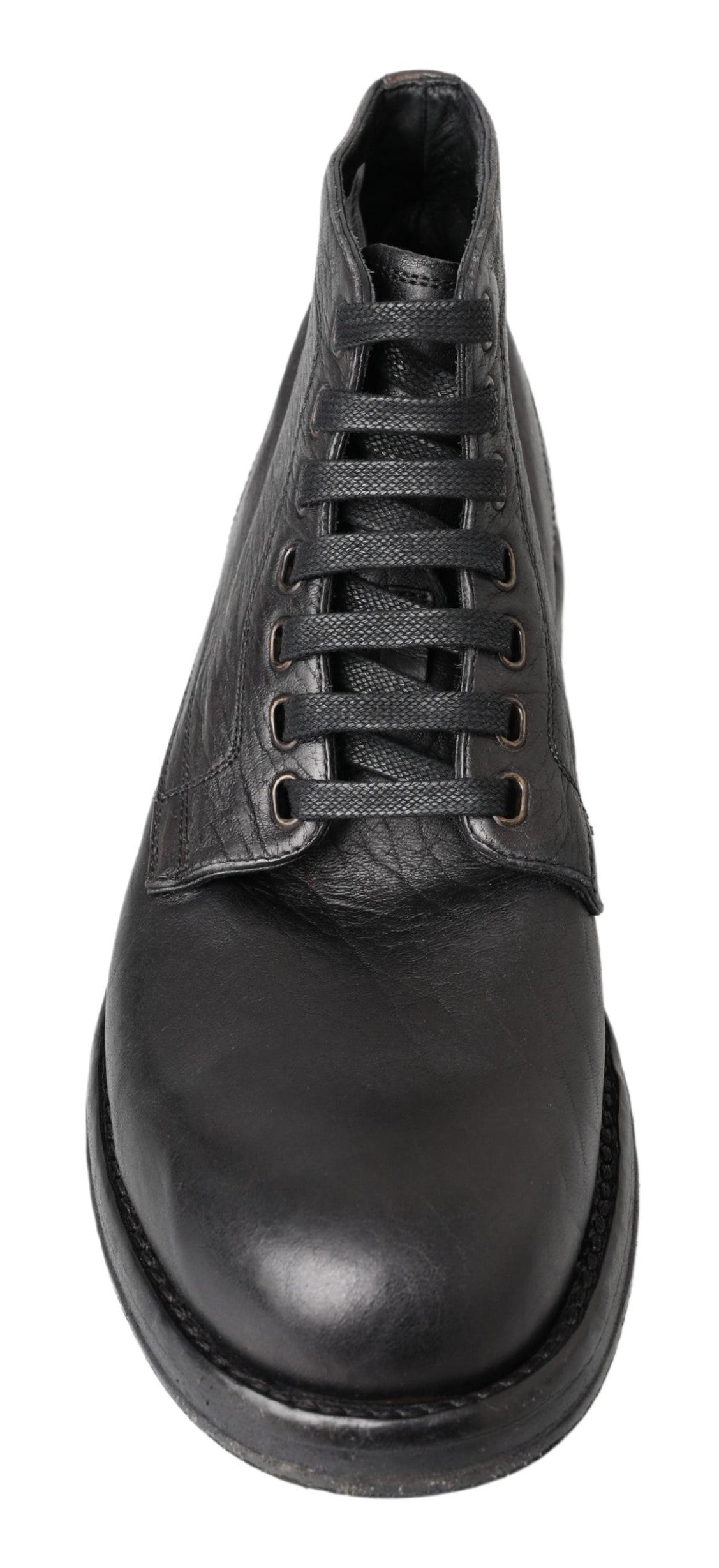 Indulge in the Dolce & Gabbana Black Horse Leather Perugino Boots, where exquisite Italian craftsmanship meets refined elegance, elevating your every step with unparalleled luxury.