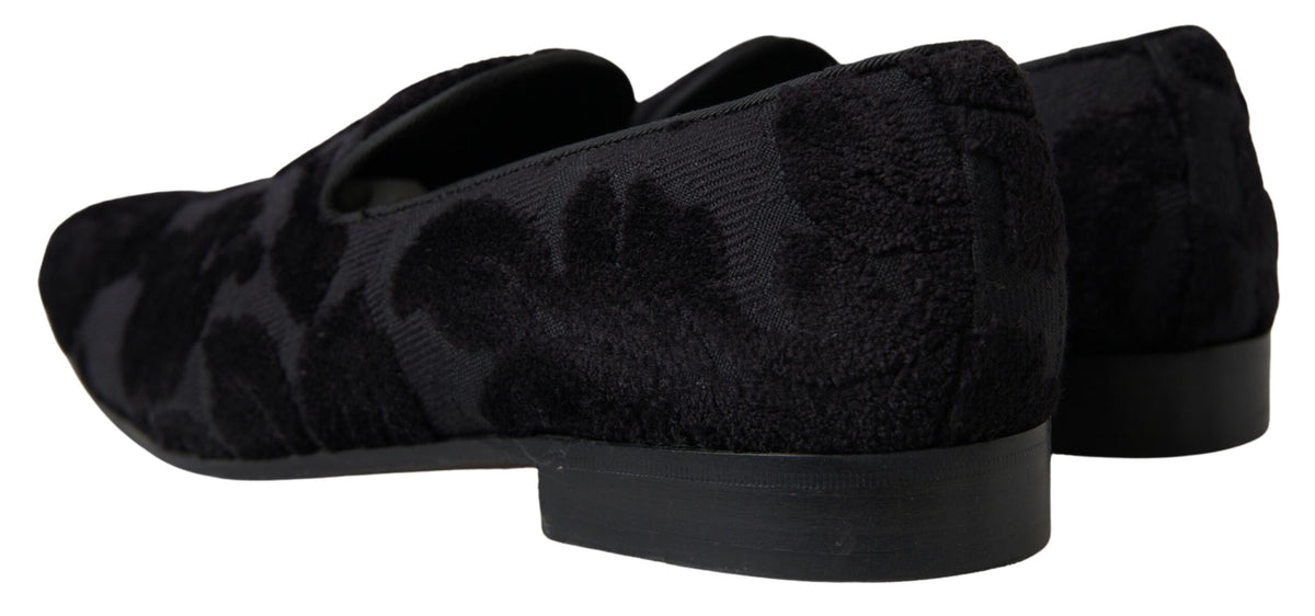 Indulge in the exquisite Dolce & Gabbana Black Brocade Loafers, where artisanal craftsmanship meets luxurious elegance, perfect for the discerning modern connoisseur.