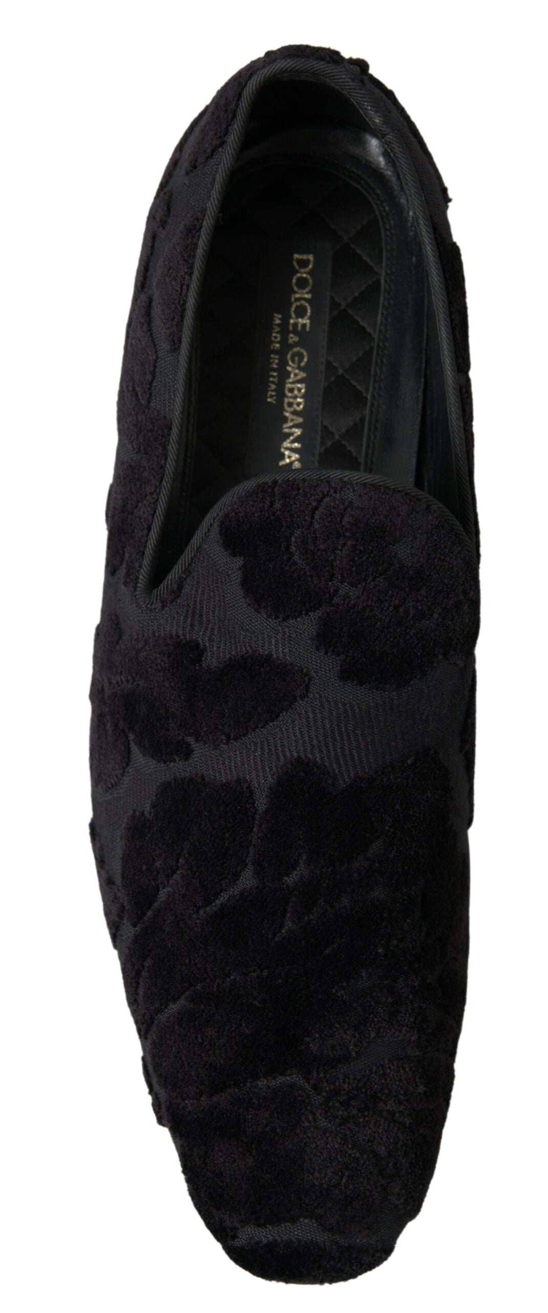 Step into refined elegance with Dolce & Gabbana Black Brocade Loafers, crafted in Italy from luxurious materials, embodying sophistication for the discerning individual.