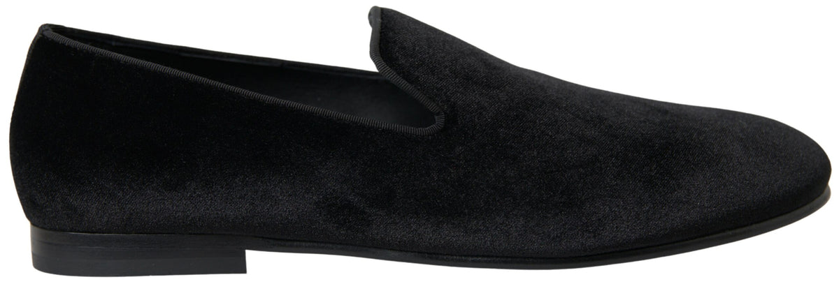 Step into elegance with Dolce & Gabbana Black Velvet Loafers, where exquisite craftsmanship meets luxurious materials, perfect for commanding attention at any occasion.