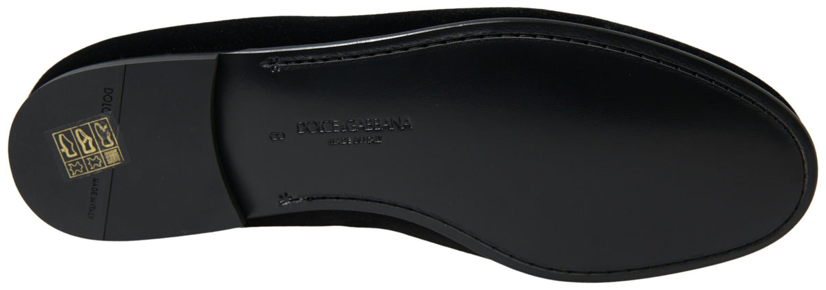Experience the allure of Dolce & Gabbana Black Velvet Loafers, where exquisite craftsmanship meets timeless elegance, perfect for commanding attention at any sophisticated occasion.