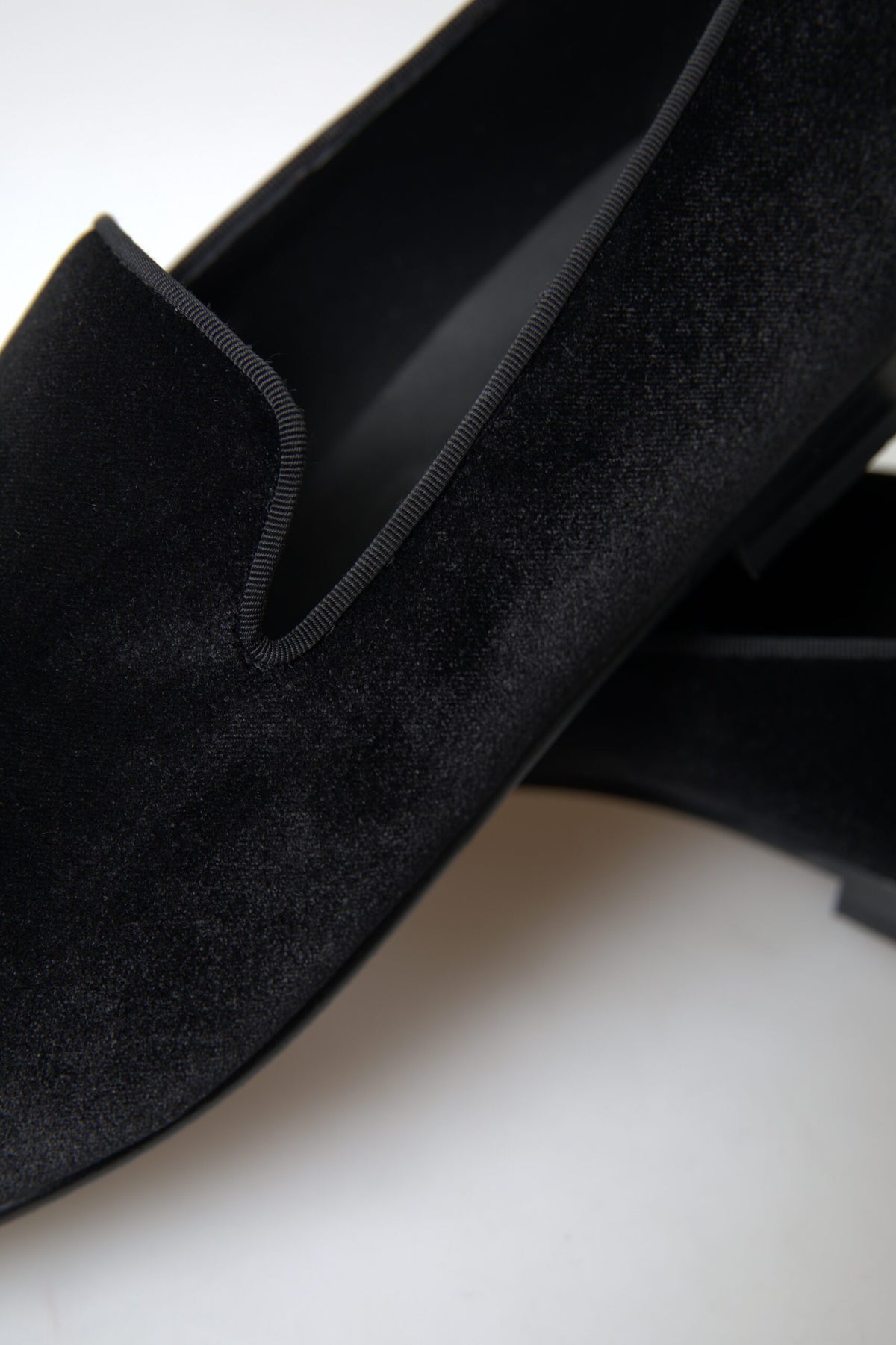 Step into sophistication with Dolce & Gabbana Black Velvet Loafers, crafted from luxurious velvet for timeless elegance, perfect for those who command attention.