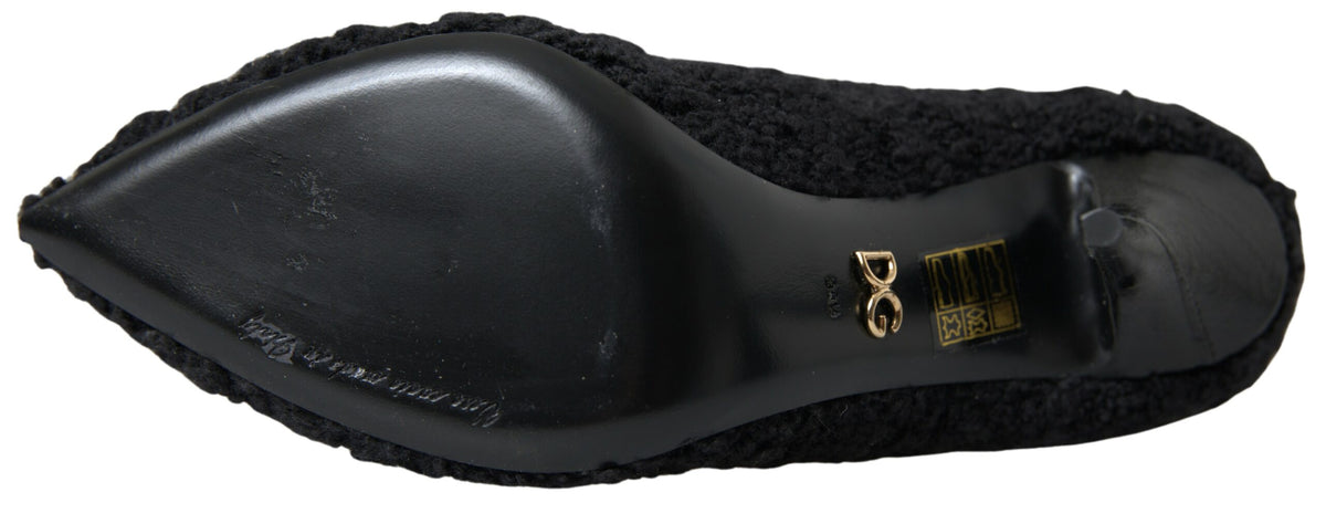 Step into the realm of luxury with Dolce & Gabbana Black Stiletto Heels Mid Calf Boots, crafted from premium virgin wool for timeless elegance and unmatched sophistication.