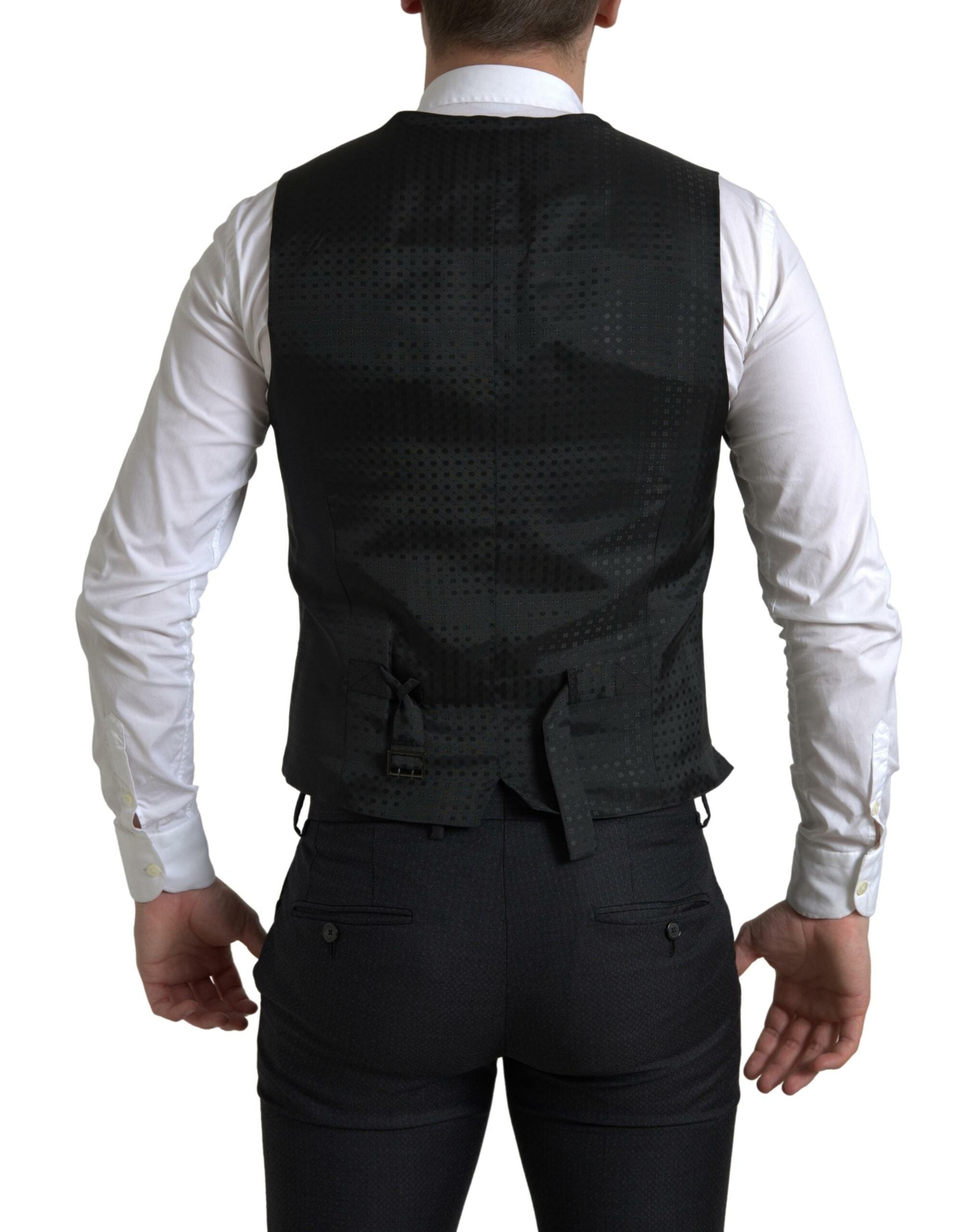 Experience the exquisite Dolce & Gabbana Black MARTINI Suit, crafted from luxurious virgin wool, embodying timeless elegance and exceptional artistry for the discerning individual.