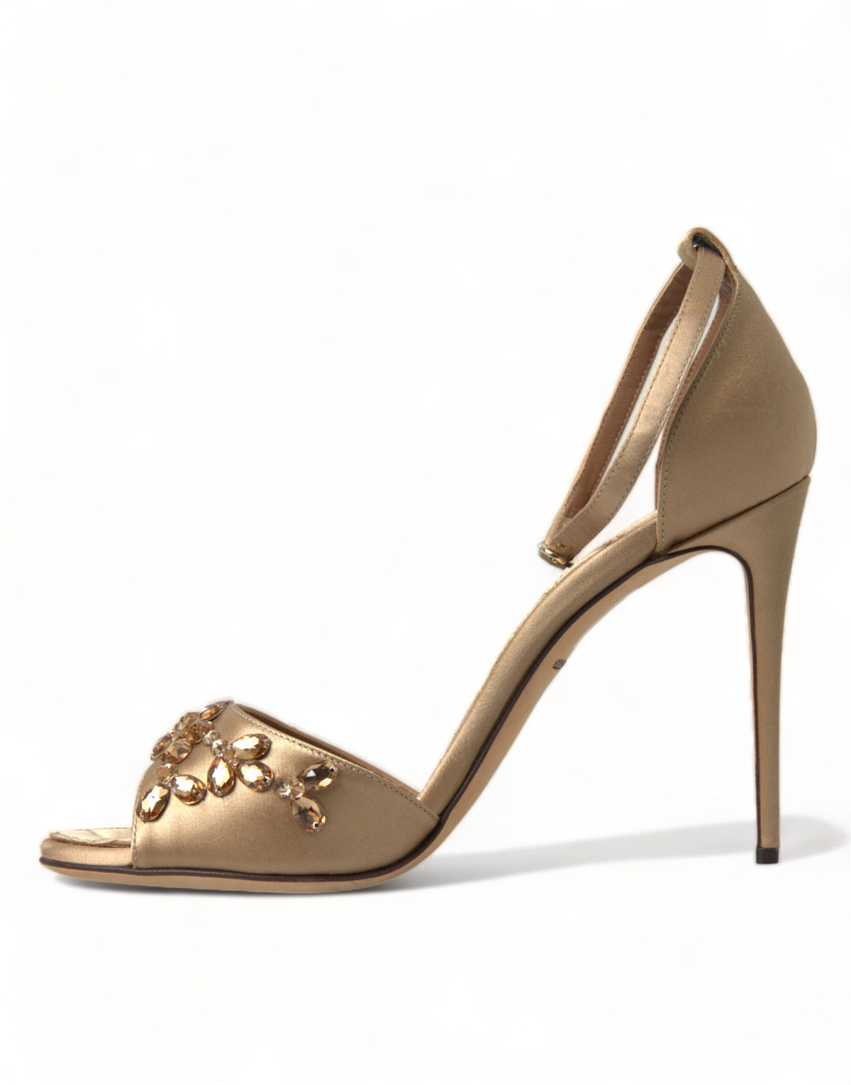 Elevate your elegance with Dolce & Gabbana's Gold Satin Ankle Strap Crystal Sandals, where exquisite craftsmanship and luxurious materials unite for unforgettable moments.