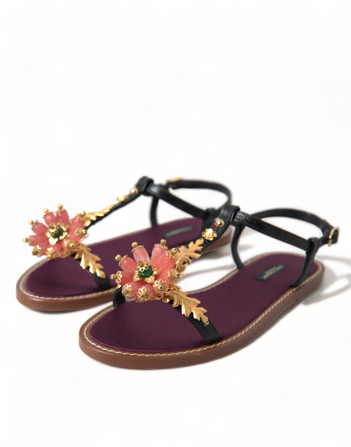 Elevate your style with Dolce & Gabbana Black Crystal Gold Sandals, crafted from premium leather, embodying exquisite Italian artistry and timeless luxury for the discerning individual.