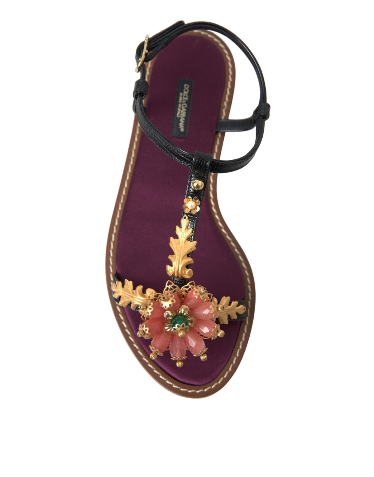 Elevate your style with Dolce & Gabbana's Black Crystal Gold Sandals, crafted from premium leather and adorned with exquisite pink stone crystals, embodying timeless luxury and Italian artistry.