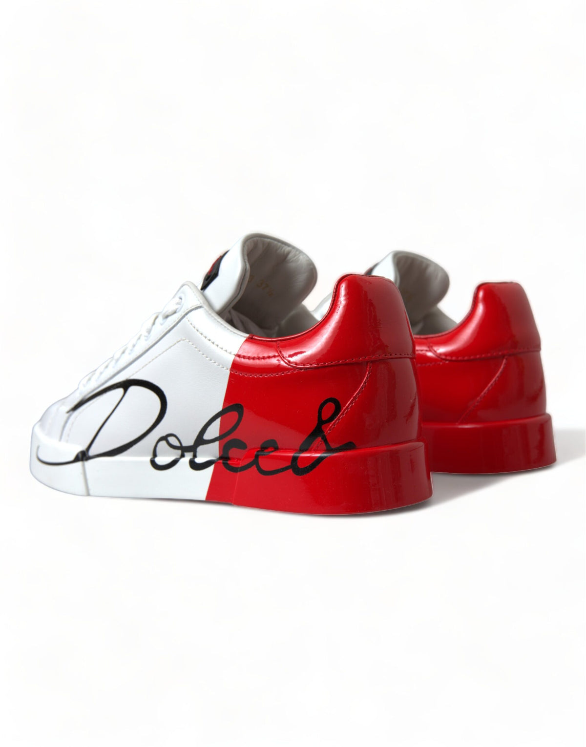 Elevate your style with Dolce & Gabbana's White Red Lace Up Women's Low Top Sneakers, crafted from luxurious leather in Italy, embodying exquisite craftsmanship and timeless elegance.