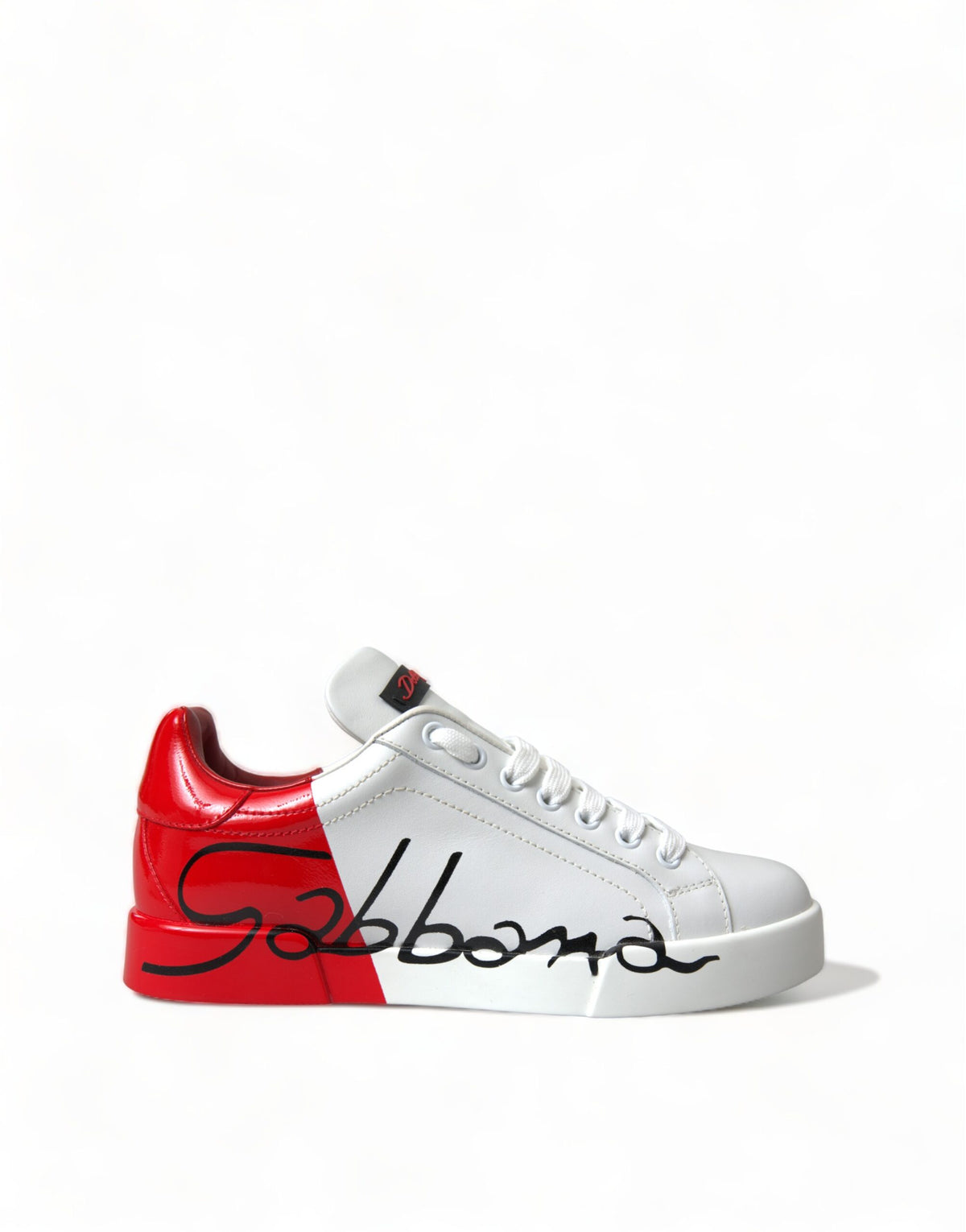 Step into the realm of luxury with Dolce & Gabbana's White Red Lace Up Women's Low Top Sneakers, crafted in Italy from exquisite leather, blending elegance and comfort for the discerning individual.