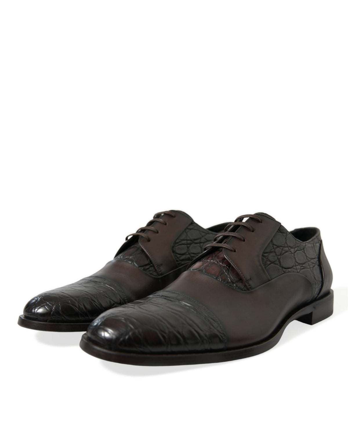 Indulge in the exquisite craftsmanship of Dolce & Gabbana's Brown Exotic Leather Formal Men Dress Shoes, where Caiman and Calfskin unite for timeless elegance.