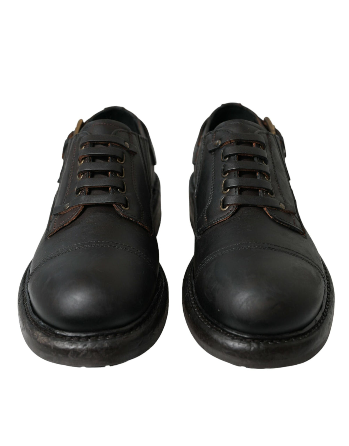 Elevate your style with Dolce & Gabbana's Brown Leather Lace Up Derby Shoes, crafted from premium leather to embody timeless luxury and exquisite Italian craftsmanship.