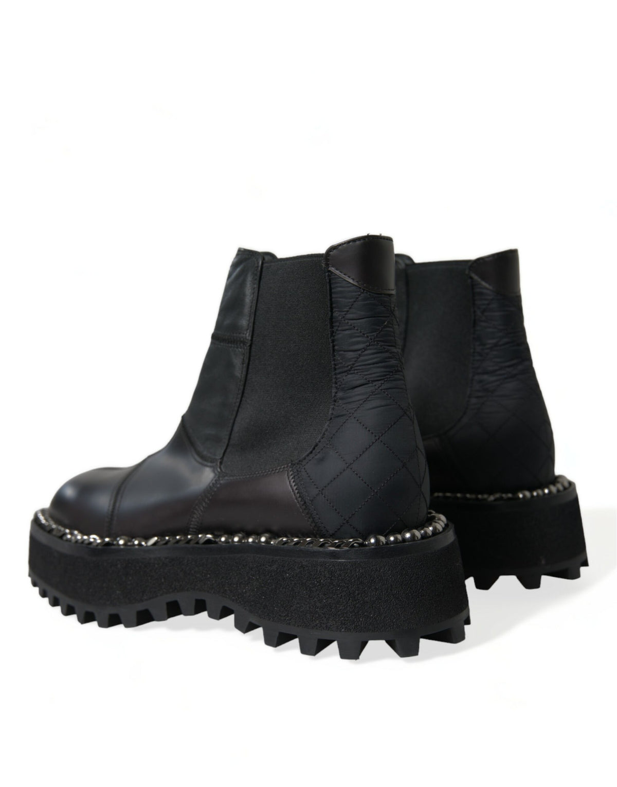 Indulge in the exquisite Dolce & Gabbana Black Leather Slip On Stretch Chelsea Boots, where unparalleled craftsmanship meets timeless elegance, perfect for the discerning individual.