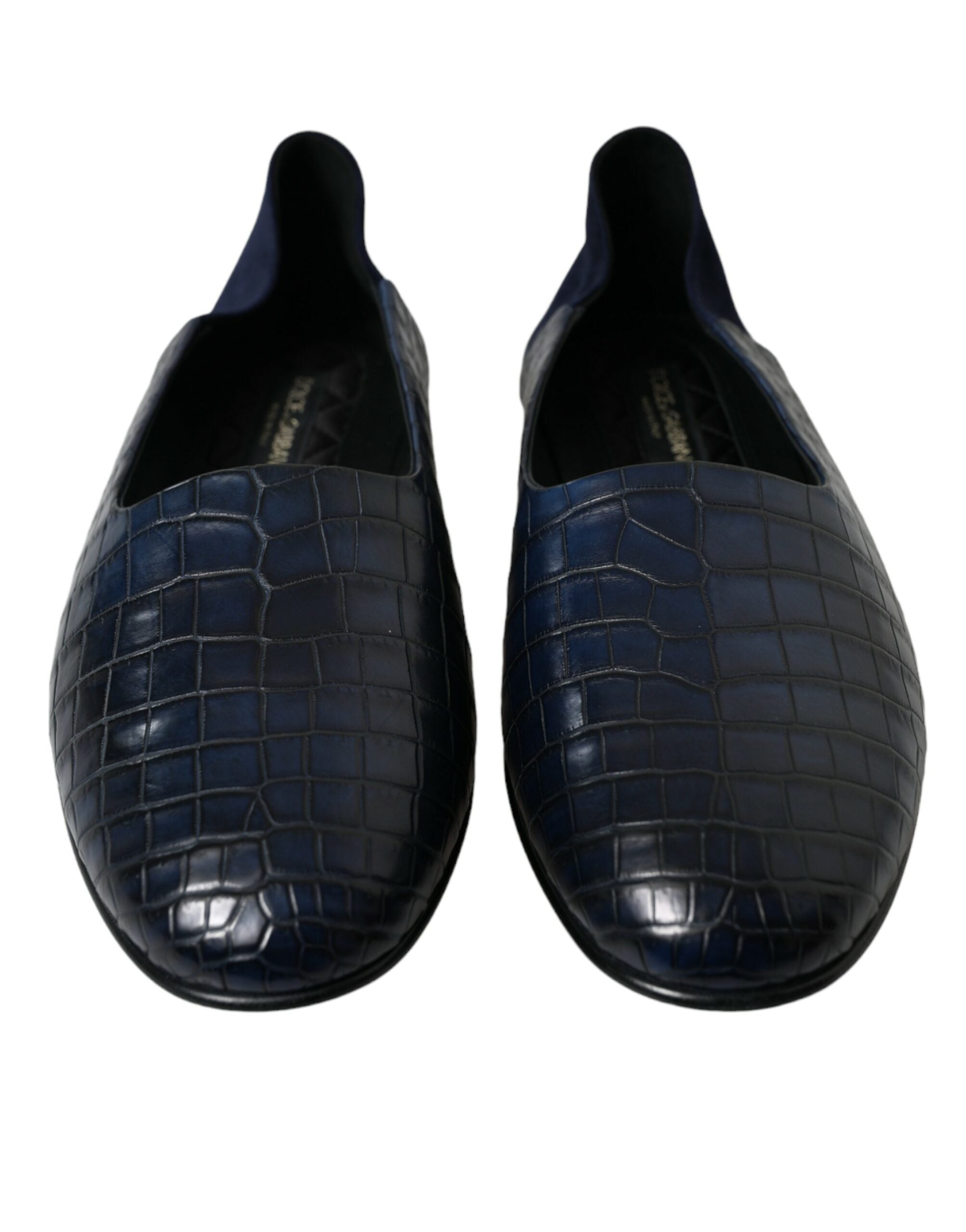 Indulge in the exquisite Dolce & Gabbana Blue Crocodile Leather Loafers, a masterpiece of Italian craftsmanship that elevates your style with timeless luxury and sophistication.
