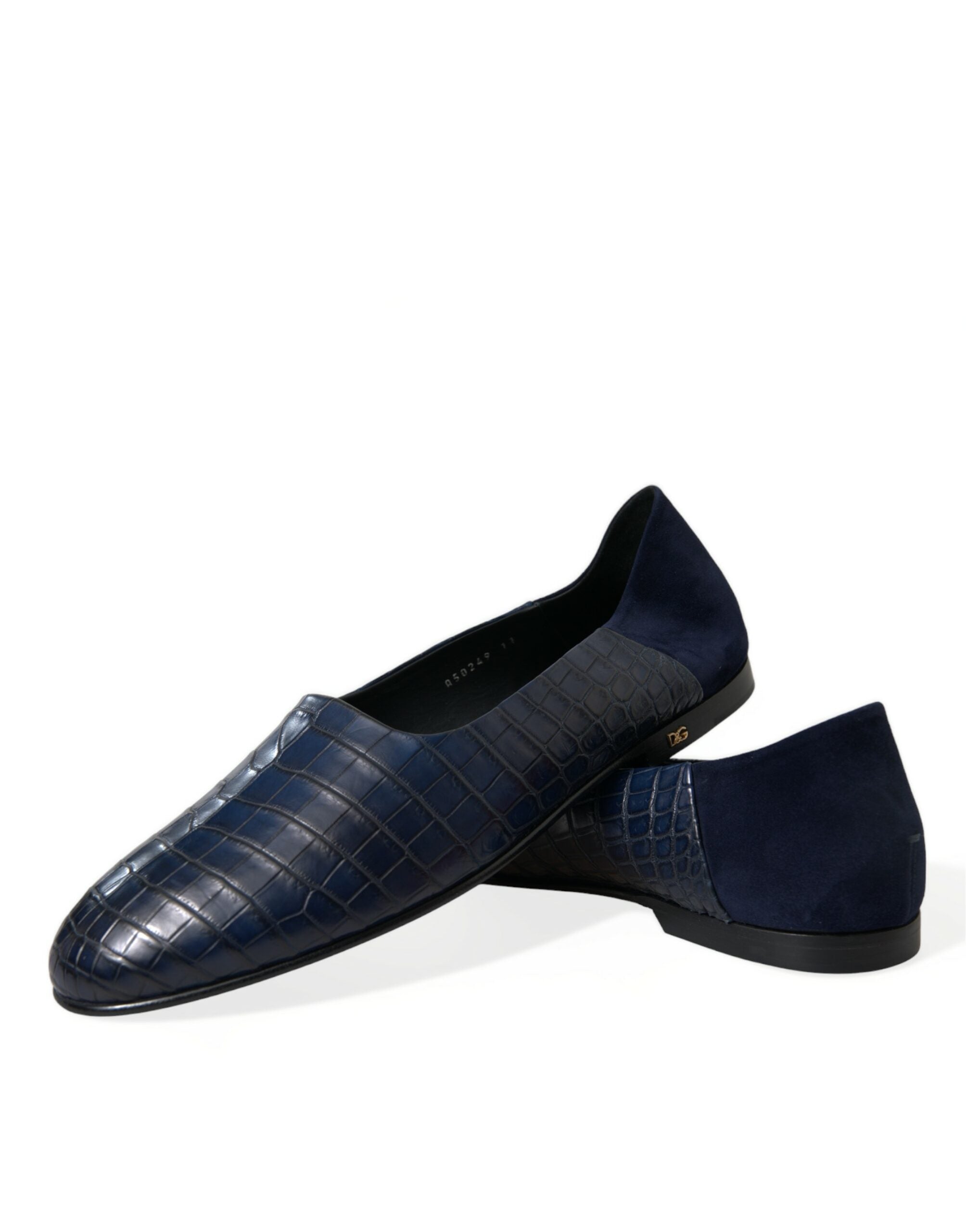 Indulge in the exquisite Dolce & Gabbana Blue Crocodile Leather Loafers, where Italian craftsmanship meets timeless luxury, elevating every step with sophistication.