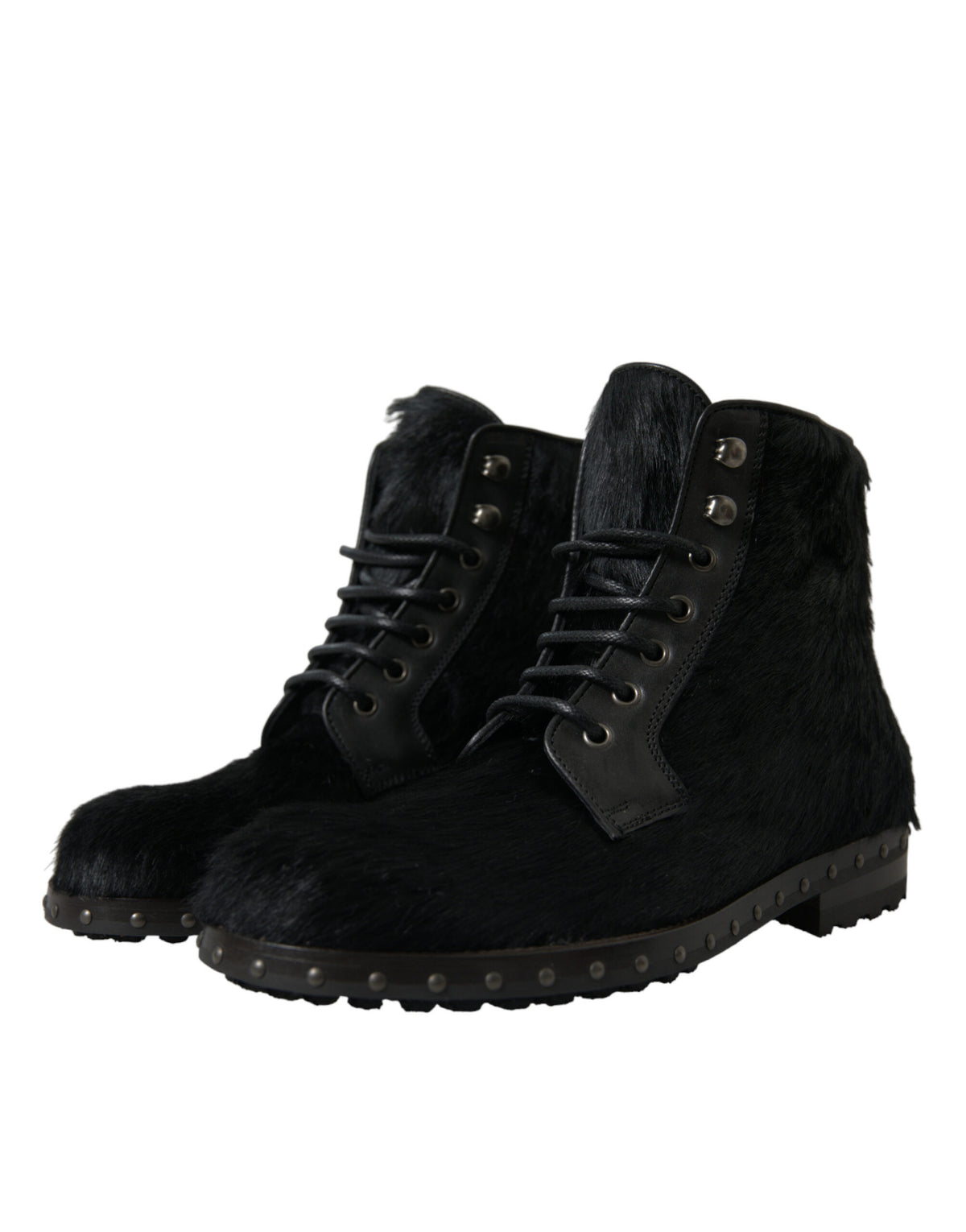 Indulge in the exquisite craftsmanship of Dolce & Gabbana's Black Pony Style Leather Mid Calf Boots, where luxurious pony skin meets timeless elegance for the discerning individual.