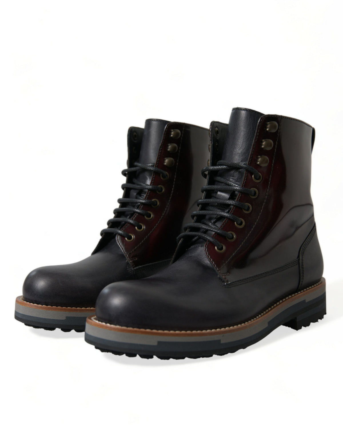 Indulge in the exquisite Dolce & Gabbana Black Leather Military Combat Boots, crafted from premium calf leather, merging timeless elegance with modern sophistication for the discerning individual.
