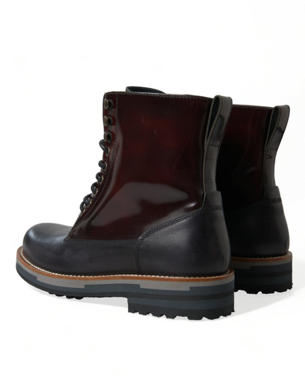 Step into luxury with Dolce & Gabbana's Black Leather Military Combat Boots, crafted from premium calf leather for the discerning individual who commands elegance and style.