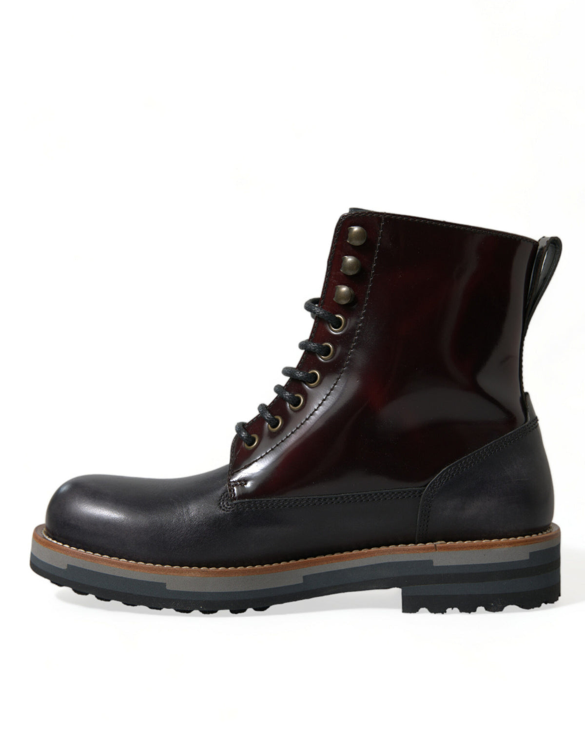 Step into luxury with Dolce & Gabbana's Black Leather Military Combat Boots, crafted from premium calf leather for the discerning individual who commands elegance and authority.