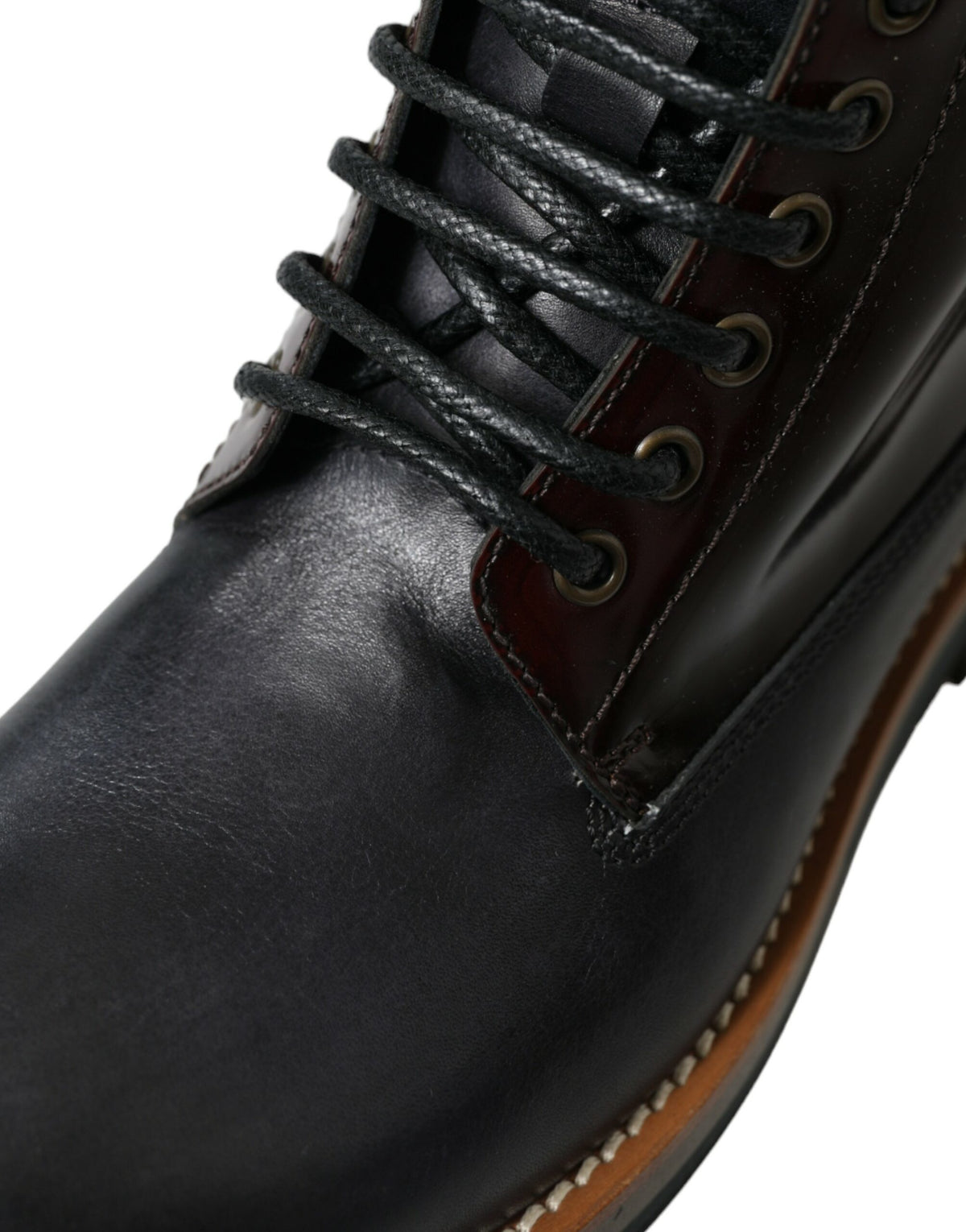 Step into luxury with Dolce & Gabbana's Black Leather Military Combat Boots, crafted from premium calf leather, embodying sophistication and timeless elegance for the discerning individual.