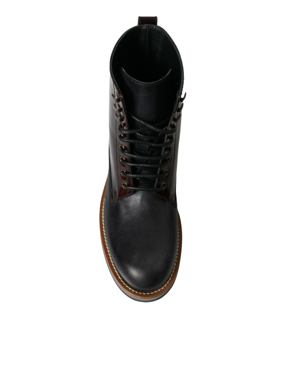 Elevate your style with Dolce & Gabbana's Black Leather Military Combat Boots, crafted from premium calf leather, embodying sophistication and timeless elegance for the discerning individual.
