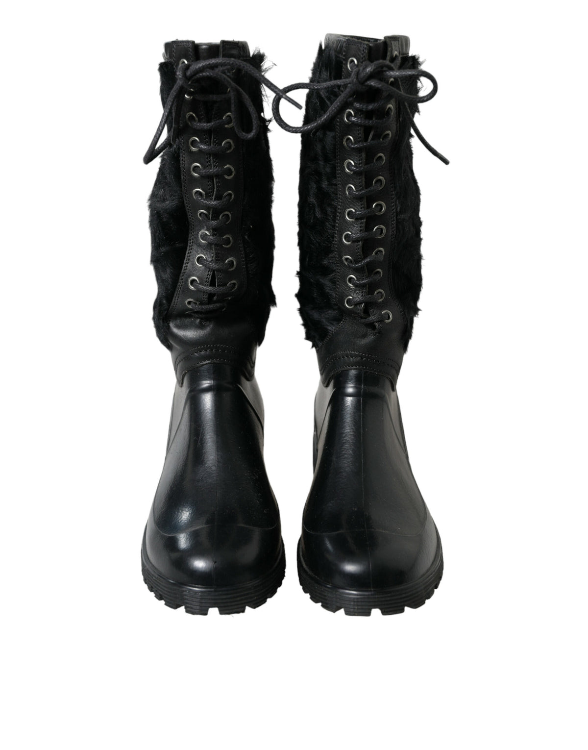 Step into sophistication with Dolce & Gabbana's Black Rubber Lace Up Shearling Rain Boots, where plush shearling meets durable rubber for timeless elegance and authority.