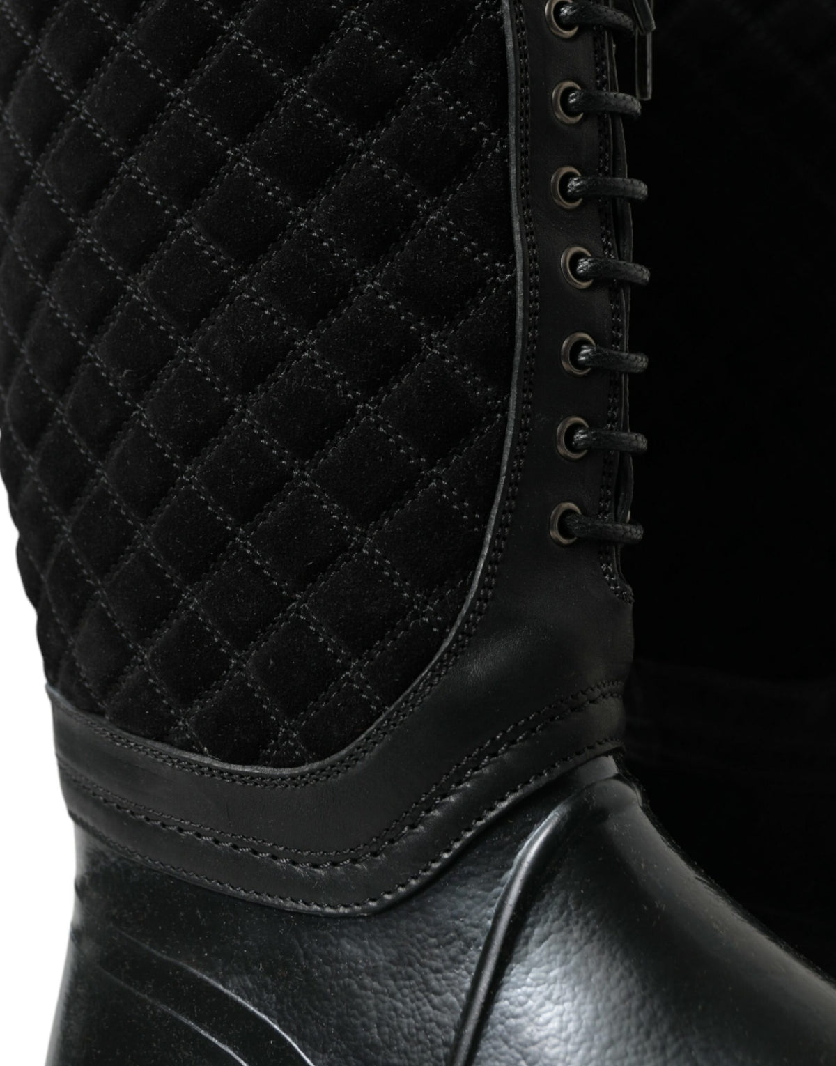 Indulge in the exquisite Dolce & Gabbana Black Chioggia Rain Boots, where luxurious calfskin and PVC meet timeless elegance, perfect for navigating life's unpredictable moments with style.