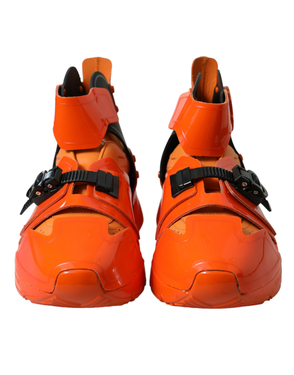 Discover the allure of Dolce & Gabbana's Orange Multi Panel Chunky High Top Sneakers, where exquisite craftsmanship meets vibrant luxury for the discerning individual.