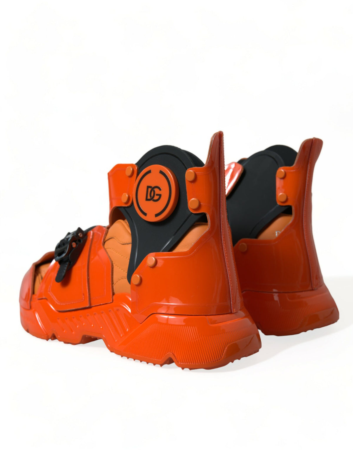 Discover the allure of Dolce & Gabbana's Orange Multi Panel Chunky High Top Sneakers, where exquisite craftsmanship meets bold luxury, perfect for the discerning individual.