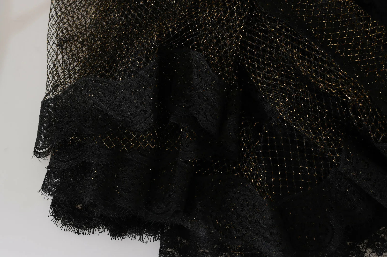 Indulge in the exquisite allure of the Dolce & Gabbana Black Gold Crystal Heart A-line Dress, a handcrafted masterpiece that embodies timeless elegance and luxurious craftsmanship.