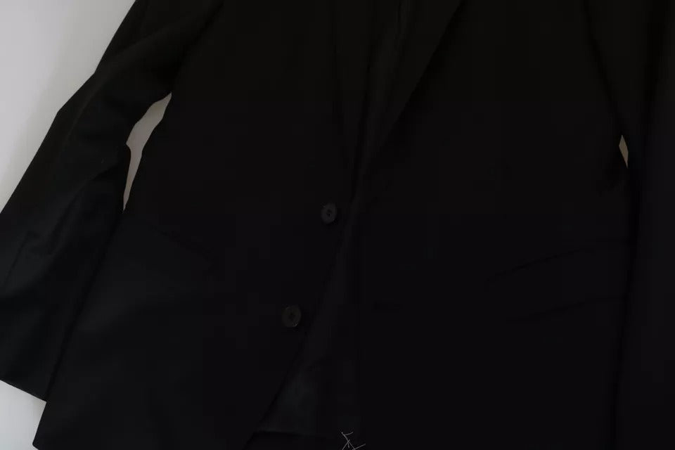 Indulge in the exquisite allure of Dolce & Gabbana's Black Slim Jacket Coat Blazer MARTINI, crafted from luxurious virgin wool for a timeless, sophisticated silhouette.