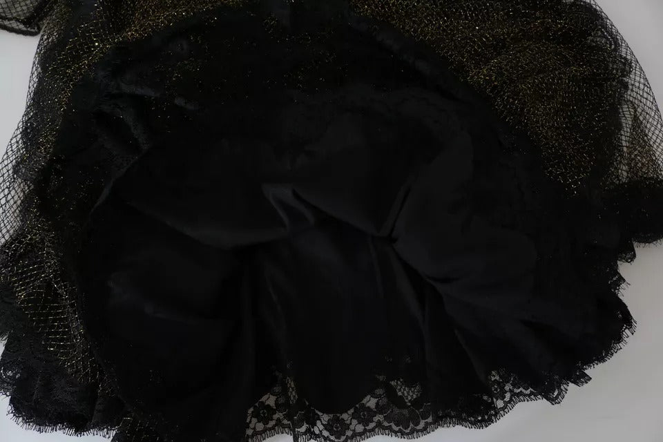 Indulge in the exquisite allure of the Dolce & Gabbana Black Gold Crystal Heart A-line Dress, where luxurious silk and Baroque embroidery elevate your elegance for any occasion.