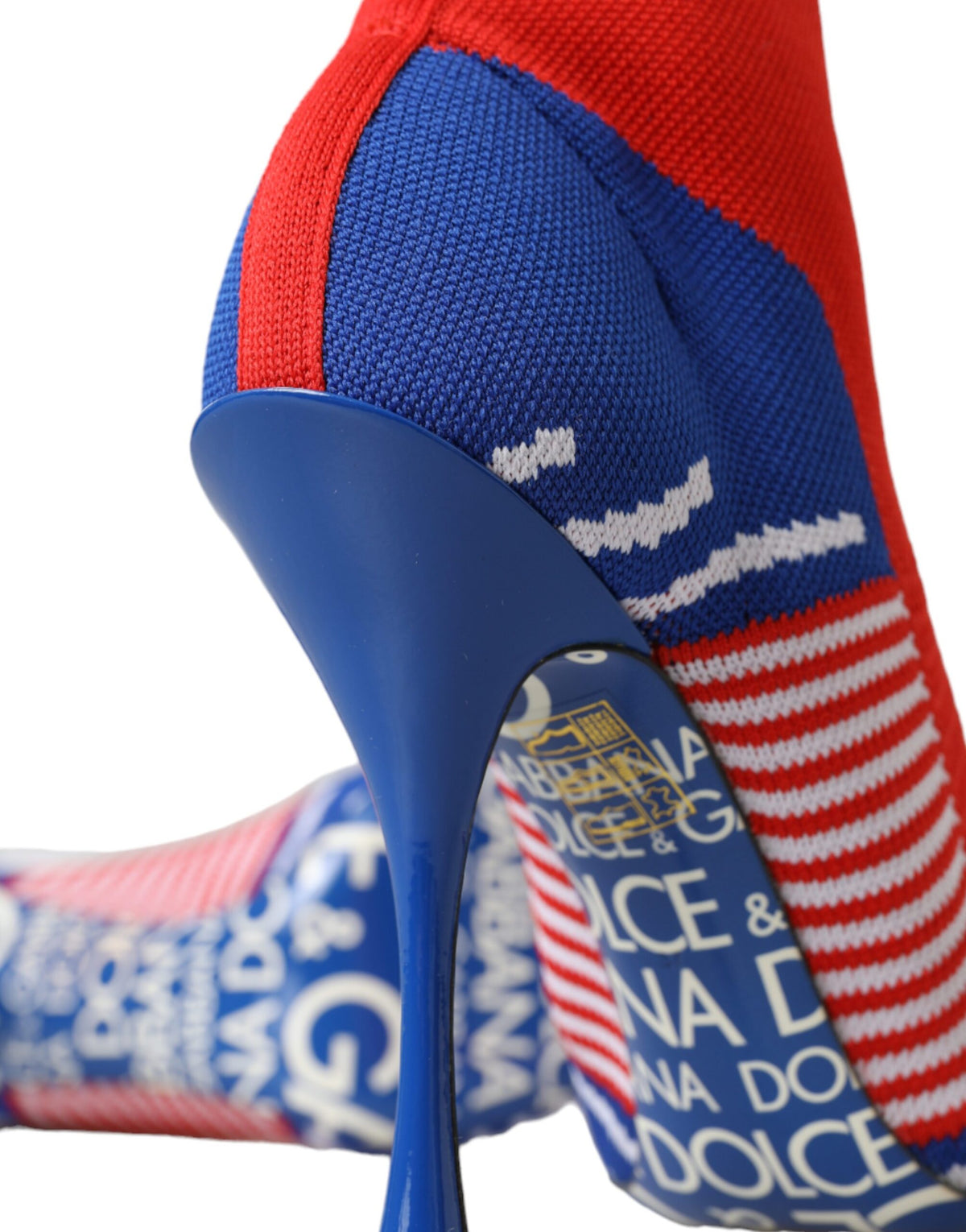 Indulge in the exquisite Dolce & Gabbana Red Blue Stretch Sock Style Ankle Boots, where luxurious materials and Italian craftsmanship elevate your style to new heights of sophistication.