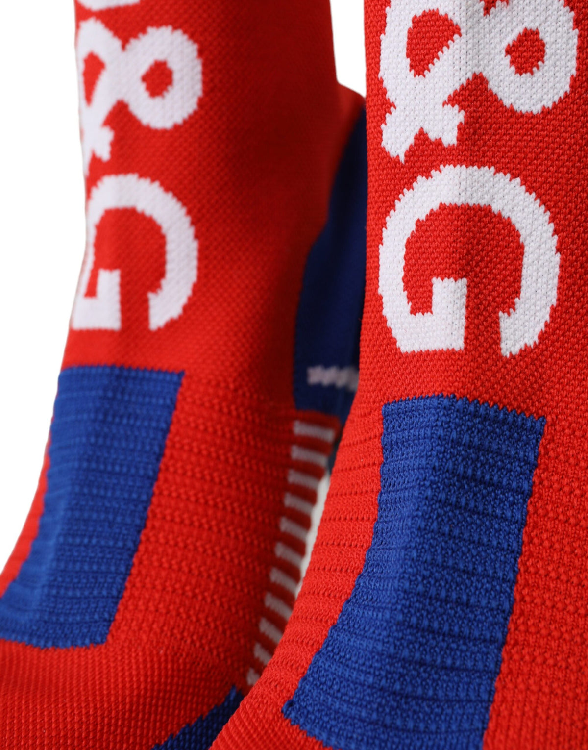 Elevate your style with Dolce & Gabbana's Red Blue Stretch Sock Style Short Boots, crafted in Italy from premium materials for unparalleled luxury and comfort.