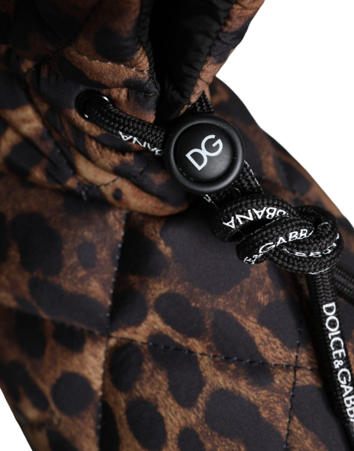 Step into a realm of elegance with Dolce & Gabbana's Brown Leopard Ankle Boots, crafted from premium nylon in Italy, embodying luxury and timeless sophistication.