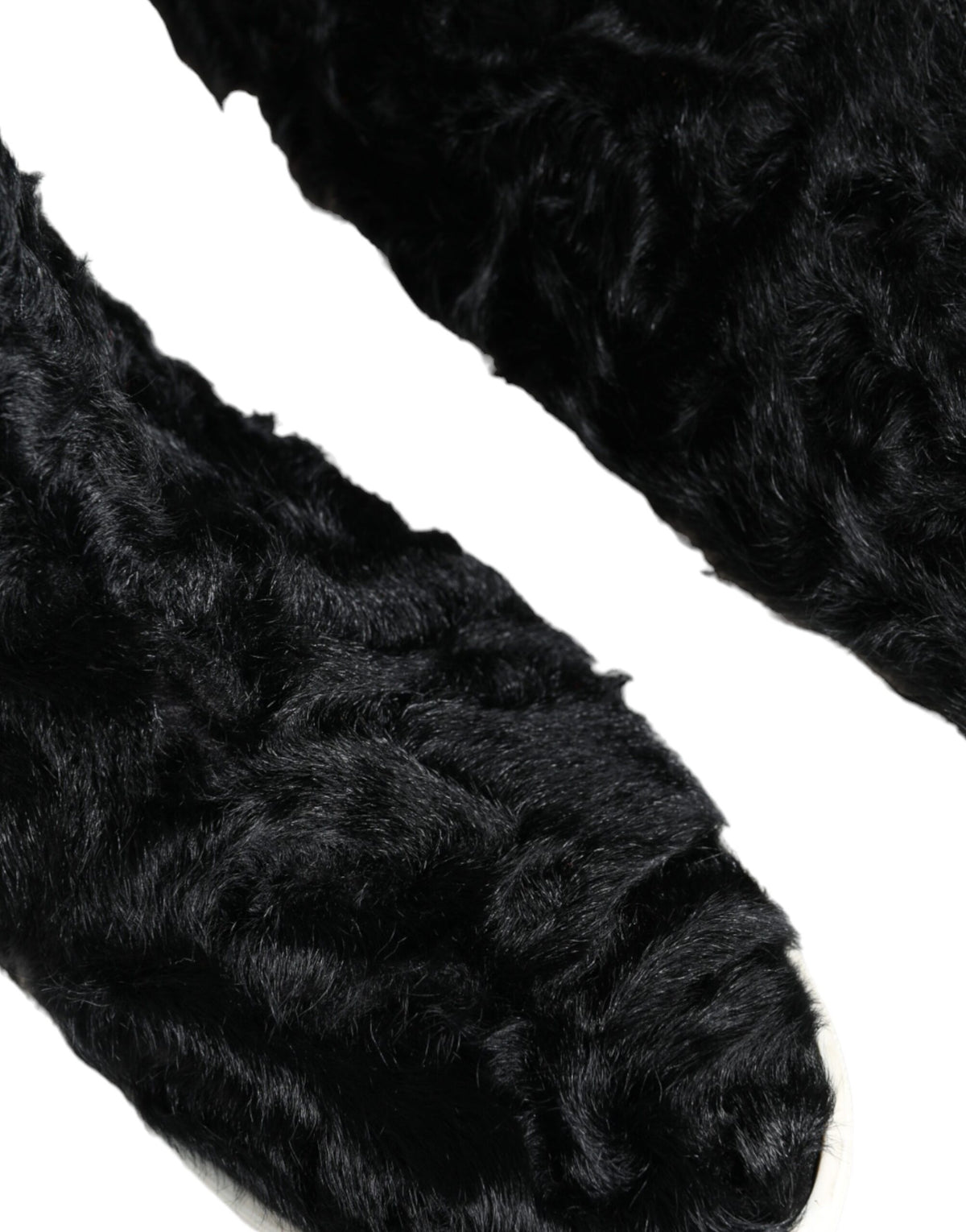 Elevate your style with Dolce & Gabbana's Black Xiangao Lamb Fur Leather Boots, a luxurious blend of exquisite craftsmanship and timeless elegance, perfect for the discerning individual.