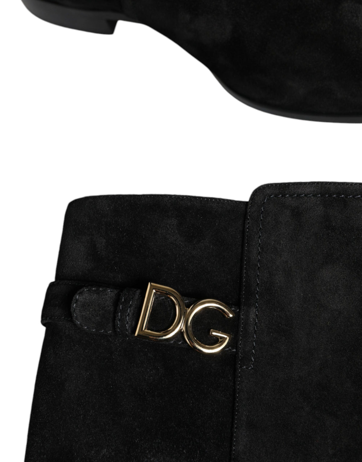 Indulge in the exquisite craftsmanship of Dolce & Gabbana's Black Suede Leather Knee High Boots, where luxury and timeless elegance elevate your style to new heights.