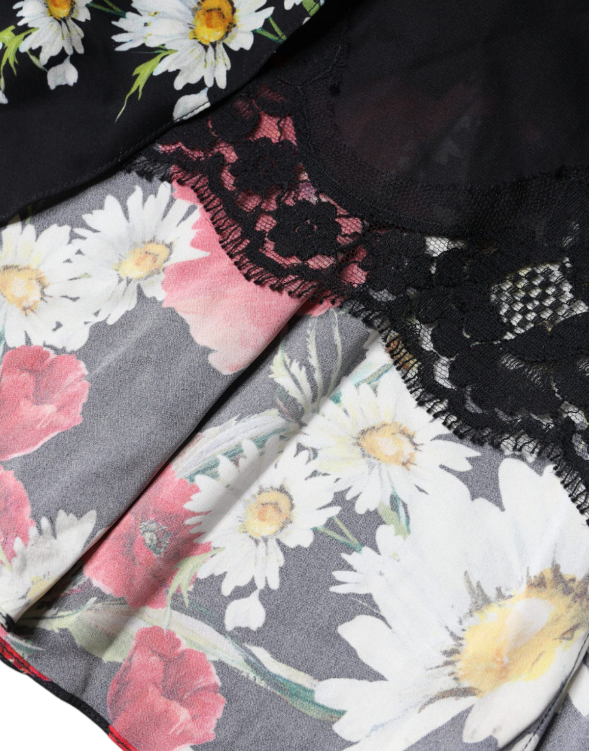 Discover the Dolce & Gabbana Black Floral Silk Sleeveless Long Gown, a masterpiece of Italian craftsmanship that embodies timeless elegance and luxurious allure for unforgettable moments.