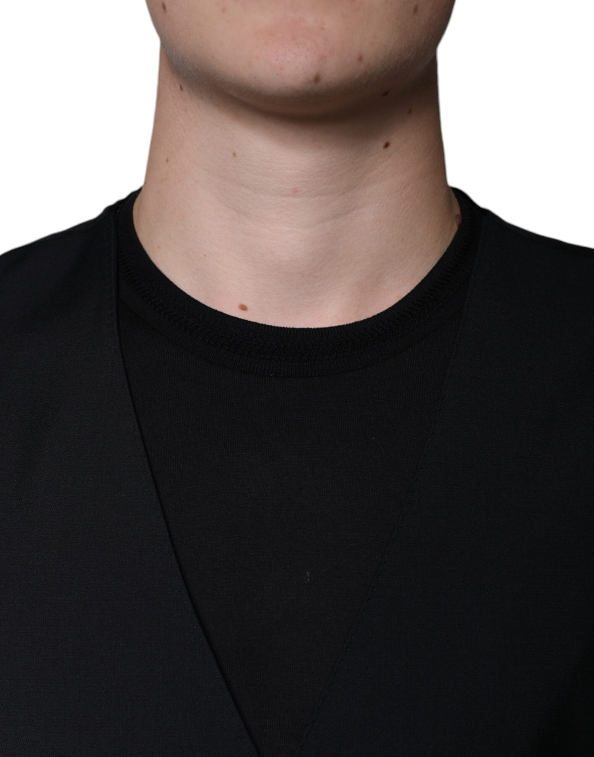 Elevate your wardrobe with the Dolce & Gabbana Black Wool Formal Dress Waistcoat Vest, a blend of exquisite craftsmanship and luxurious materials, perfect for any sophisticated occasion.
