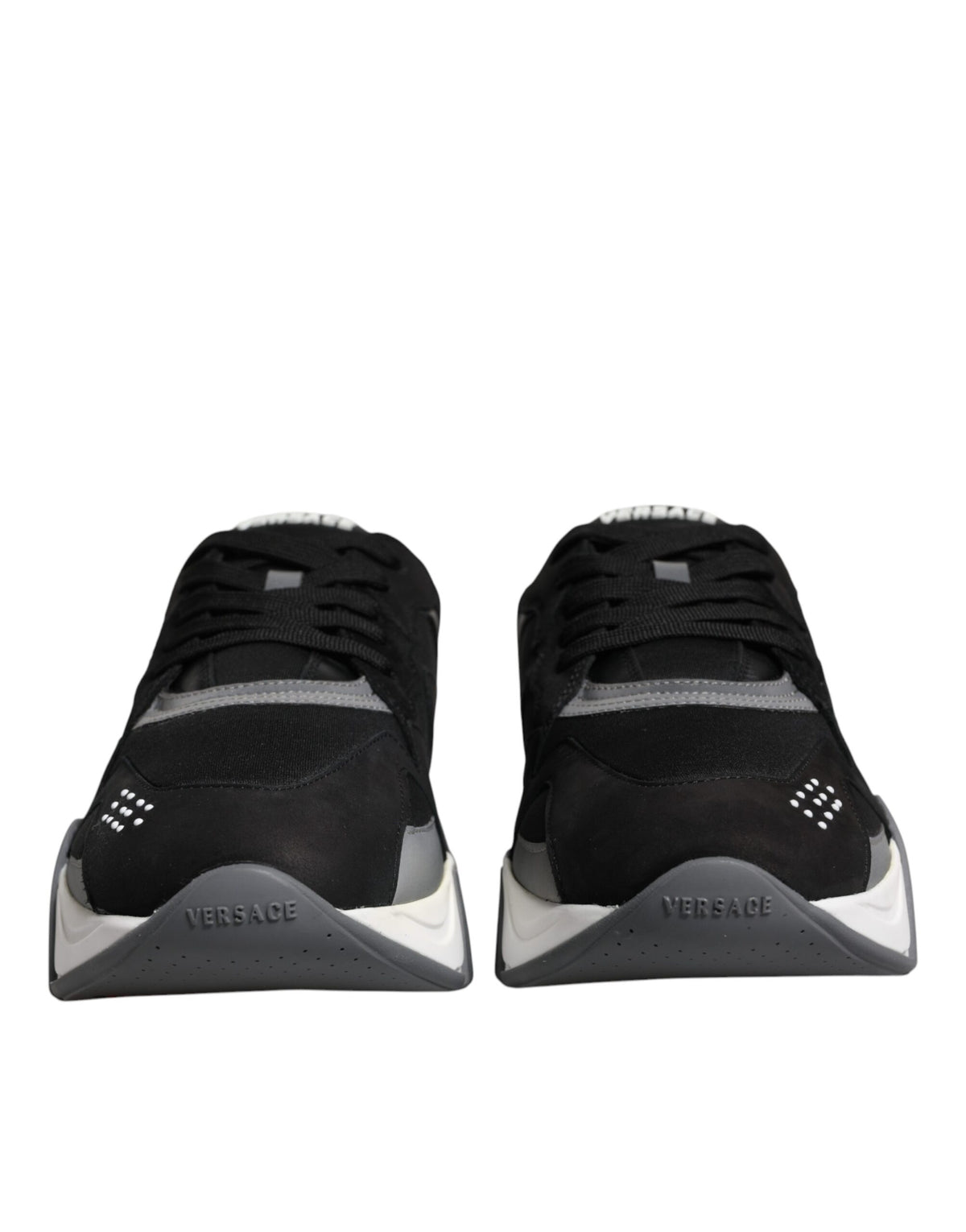 Elevate your style with Versace's Black Leather Neoprene Chunky Low Top Sneakers, a luxurious blend of Italian craftsmanship and bold design, perfect for any sophisticated occasion.