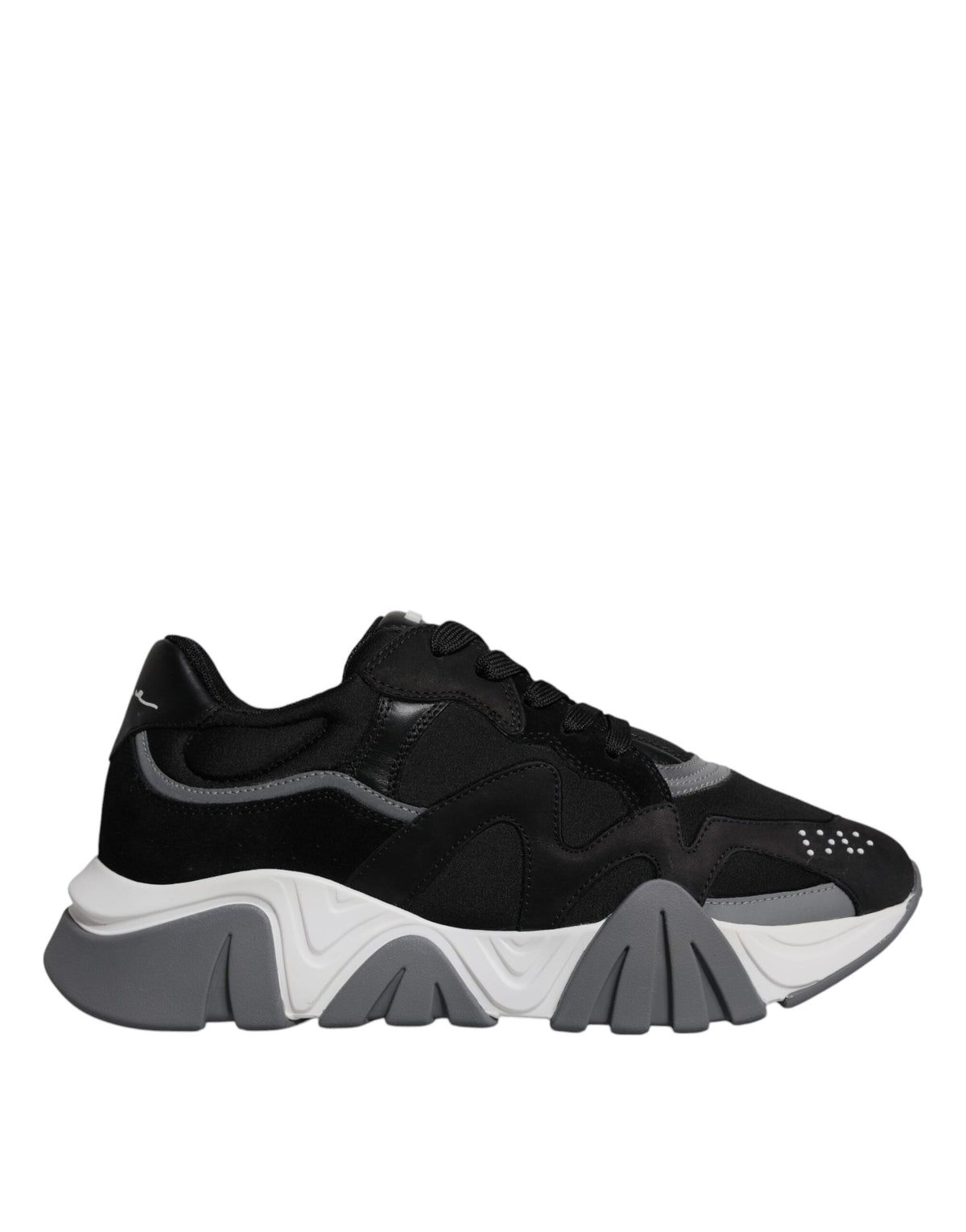 Indulge in the exquisite Versace Black Leather Neoprene Chunky Low Top Sneakers, where Italian craftsmanship meets bold elegance, perfect for any sophisticated ensemble.
