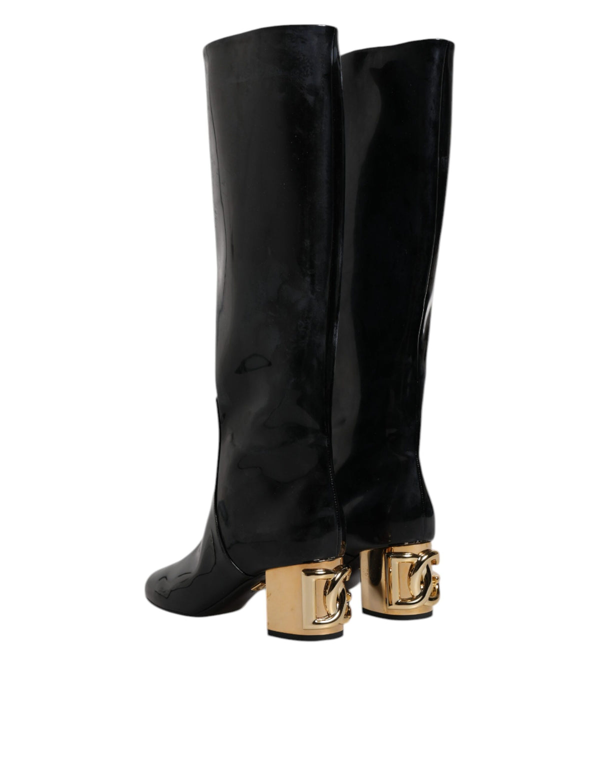 Discover the exquisite Dolce & Gabbana Black Patent Leather Vally High Boots, where opulent craftsmanship meets timeless elegance, perfect for the discerning individual.