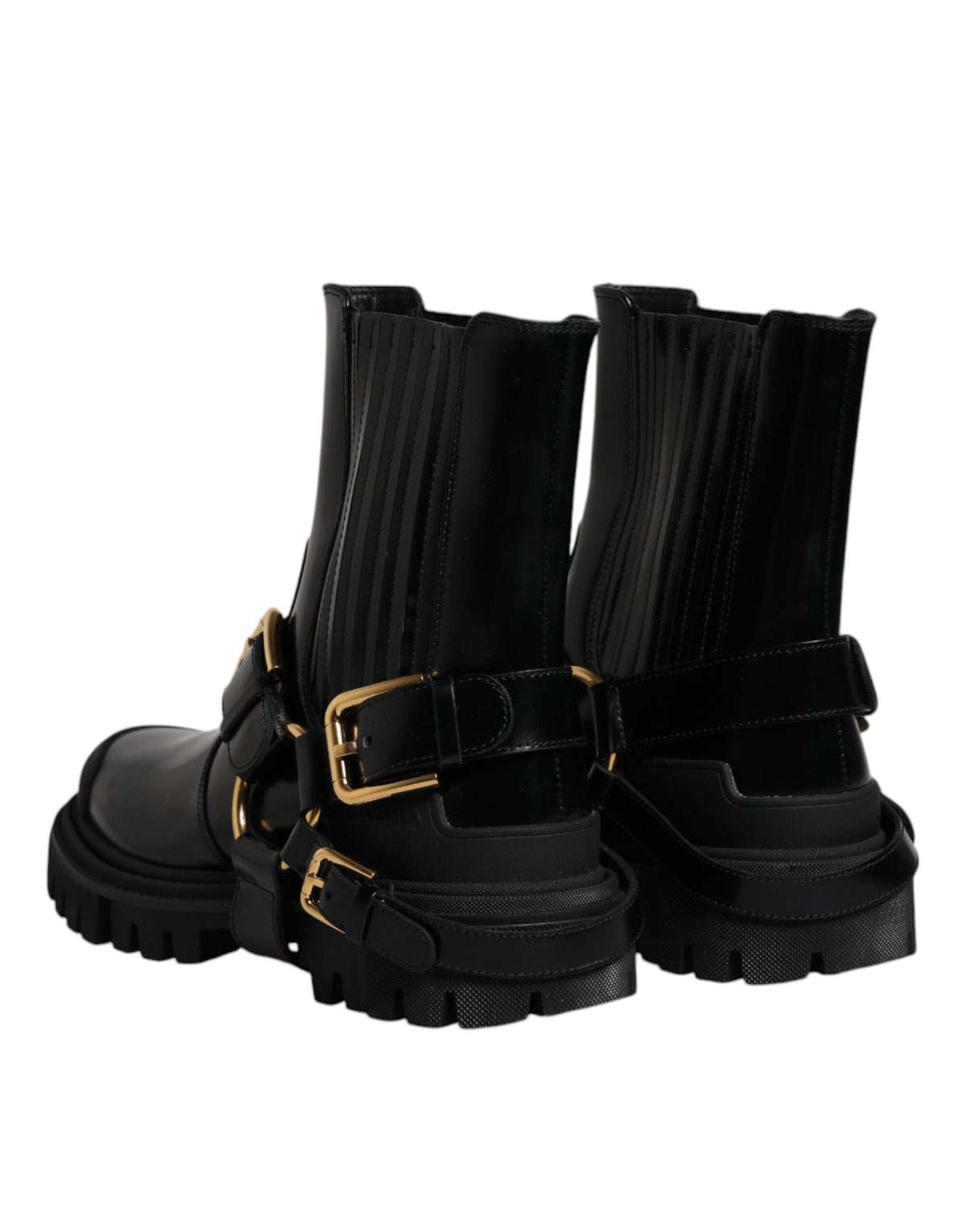Discover the Dolce & Gabbana Black Leather Slip On Stretch Trekking Boots, where exquisite craftsmanship meets luxurious materials for timeless elegance and unmatched sophistication.