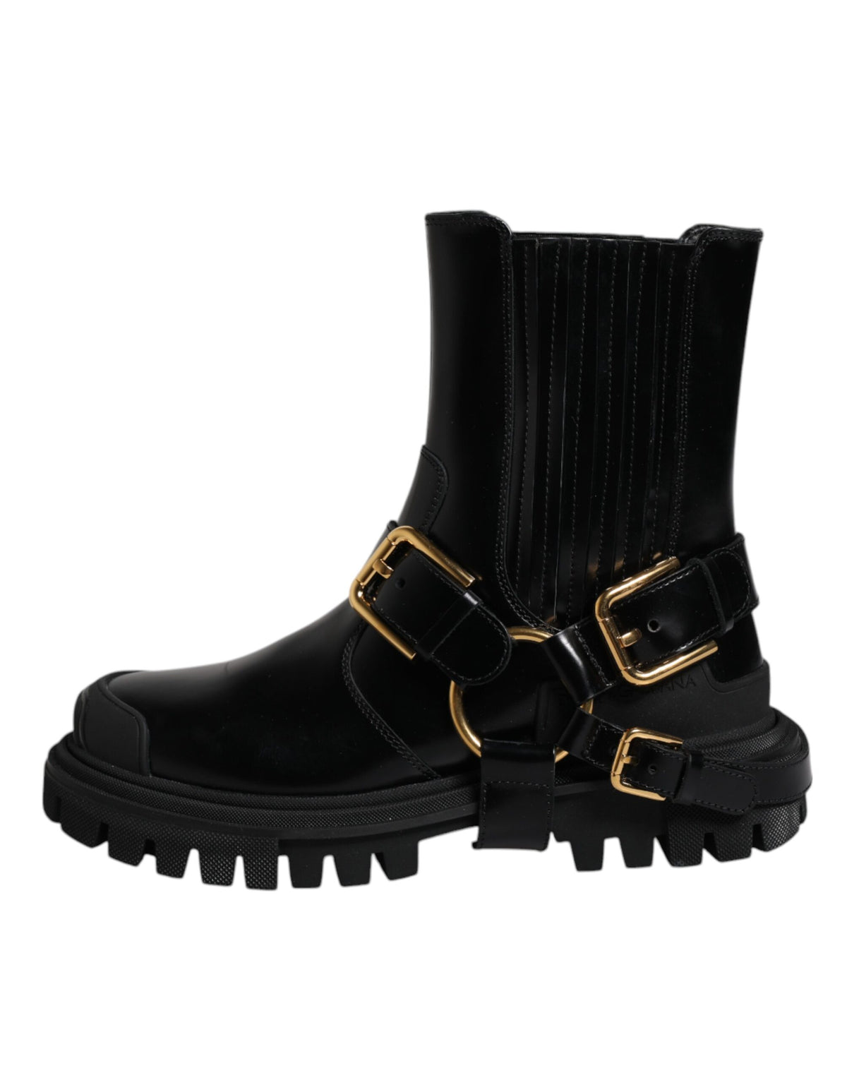 Experience the allure of Dolce & Gabbana's Black Leather Slip On Stretch Trekking Boots, where exquisite craftsmanship meets luxurious materials for timeless elegance.
