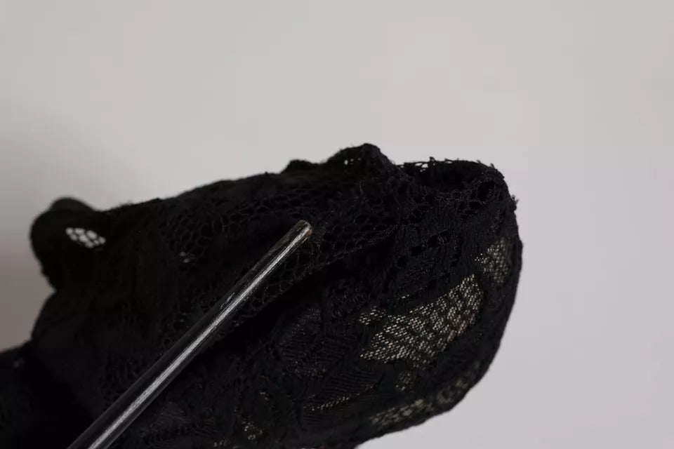 Indulge in the exquisite allure of Dolce & Gabbana's Black Lace Stretch Heels, where Italian craftsmanship meets seductive elegance, perfect for any sophisticated occasion.