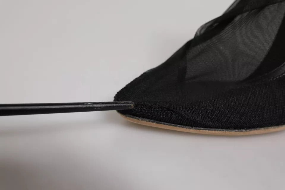 Elevate your style with Dolce & Gabbana's Black Nylon Stretch Mesh Sock Boots, a masterpiece of Italian craftsmanship, blending luxury and comfort for the discerning individual.
