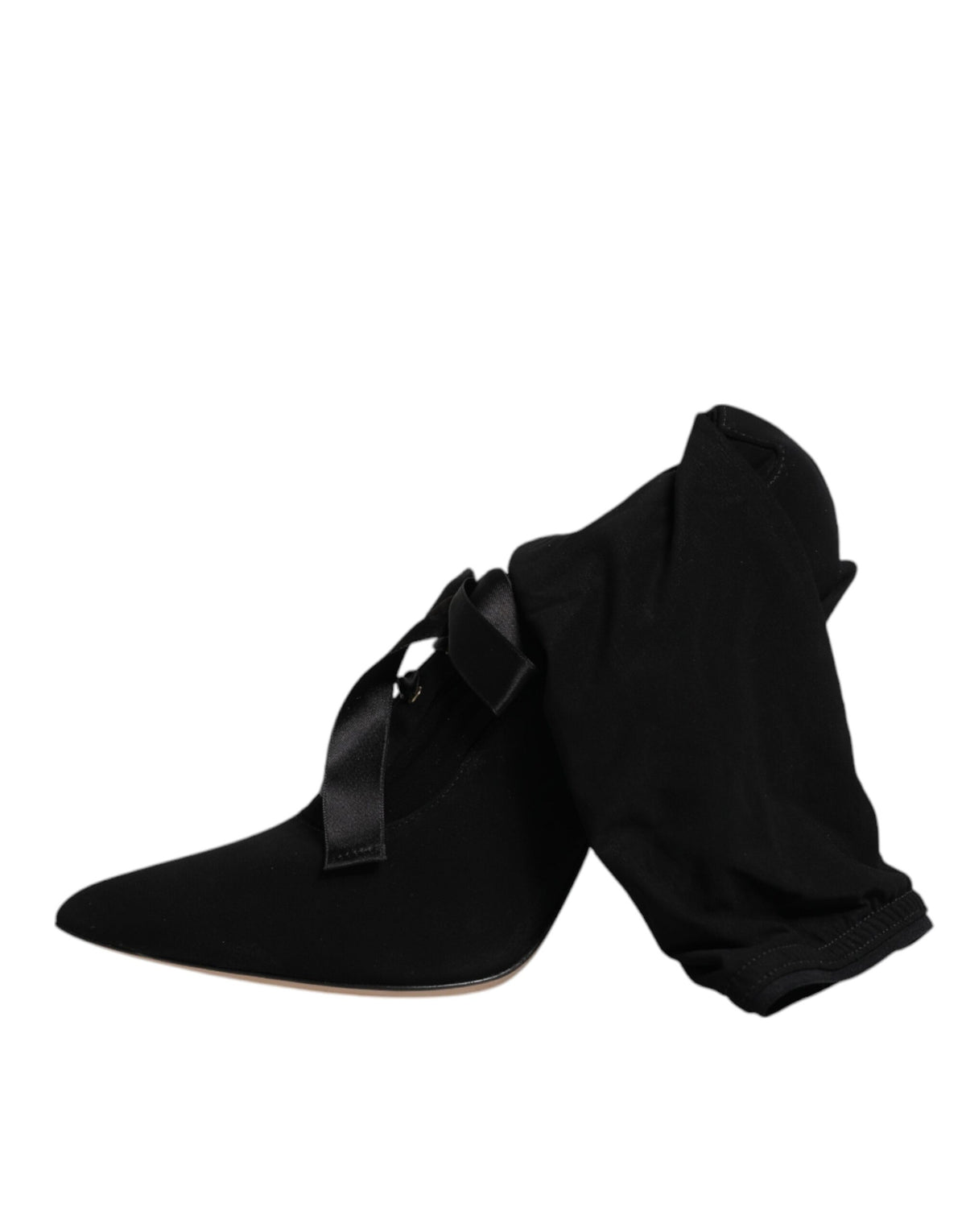 Step into a world of elegance with Dolce & Gabbana's Black Stiletto Heels Mid Calf Boots, crafted from luxurious lambskin leather for the discerning individual.