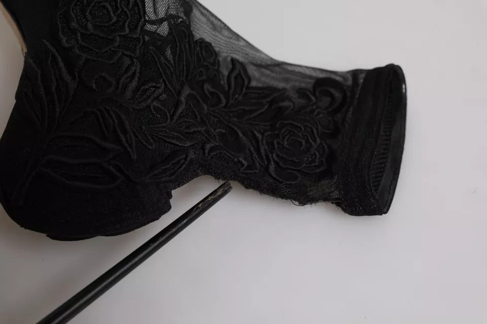 Step into a realm of elegance with Dolce & Gabbana's Black Tulle Stretch Heels, crafted in Italy from premium nylon, embodying luxury and sophistication for every occasion.